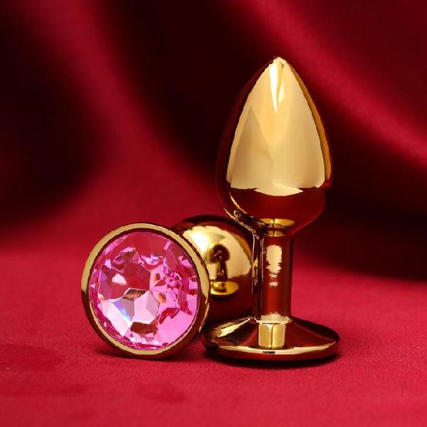 Золотистая анальная пробка с розовым кристаллом от Сима-Ленд
