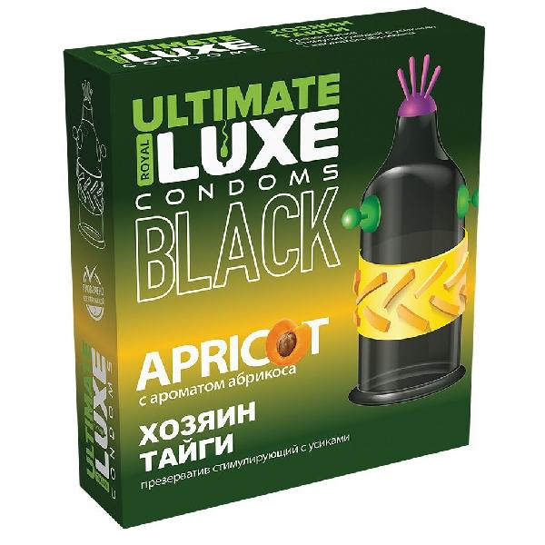 Черный стимулирующий презерватив  Хозяин тайги  с ароматом абрикоса - 1 шт. от Luxe