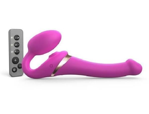 Ярко-розовый безремневой страпон Multi Orgasm Size S с клиторальной стимуляцией от Strap-on-me
