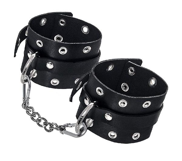 Черные кожаные однослойные наручники с люверсами от Pecado