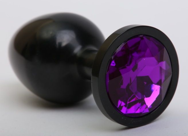 Чёрная анальная пробка с фиолетовым стразом - 8,2 см. от 4sexdreaM
