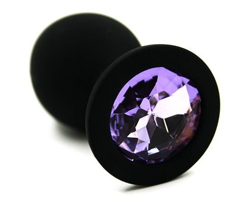 Чёрная силиконовая анальная пробка с светло-фиолетовым кристаллом - 7 см. от Kanikule